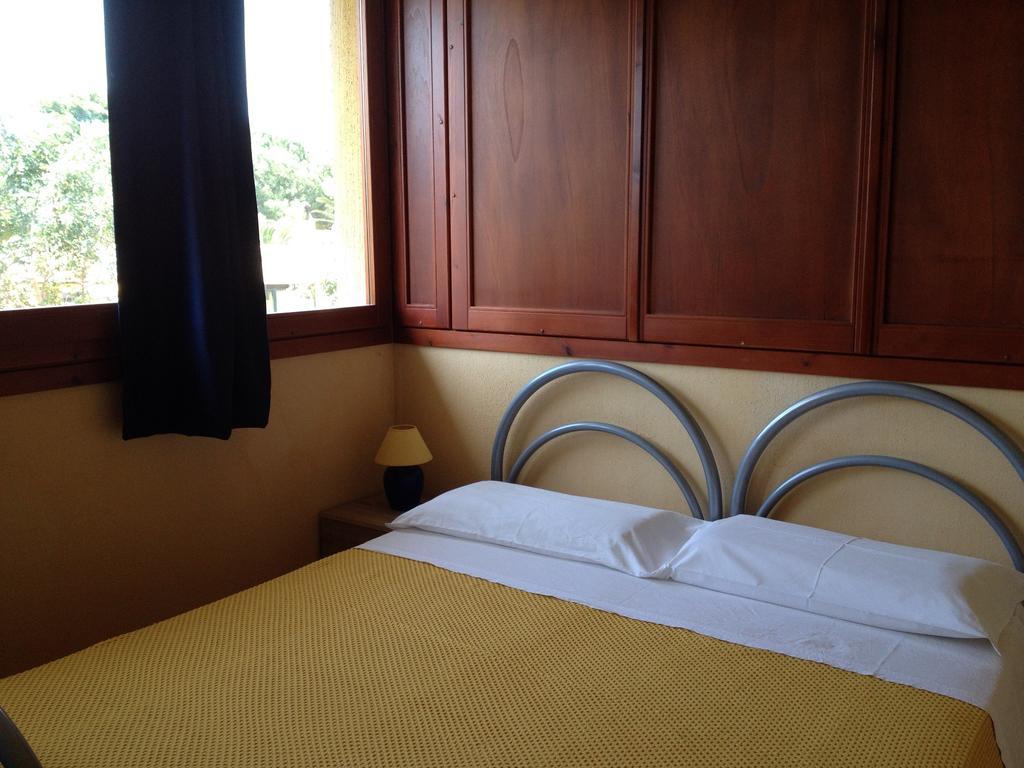 I Lentischi Aparthotel Villasimius Ruang foto